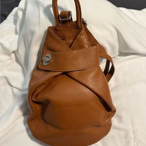 Genuine leather bag. Backpack style.
